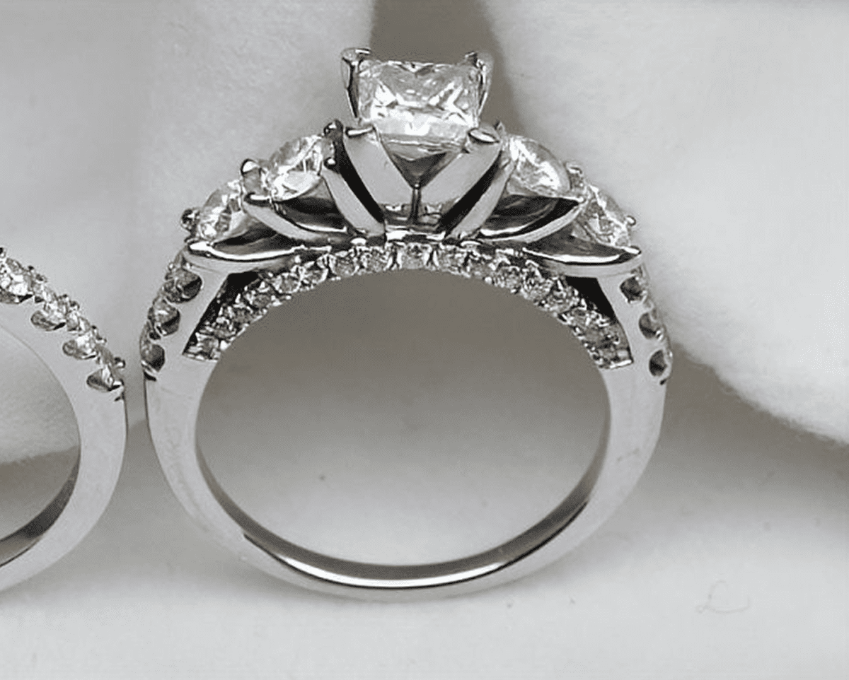 Diamond engagement ring with intricate design.